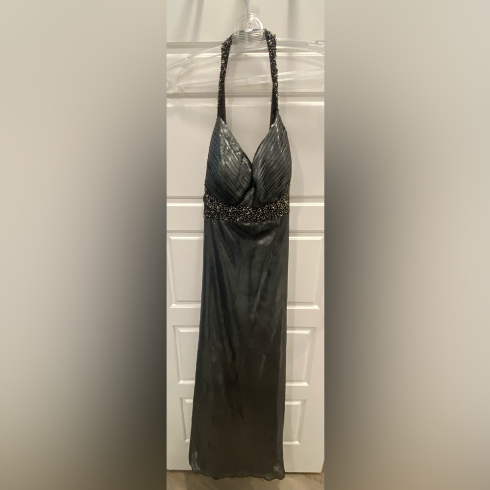 A.W.G.S. Size 14. Fits like 10/12. Metallic Gray w/ Black undertone.